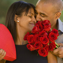 black-man-giving-woman-roses